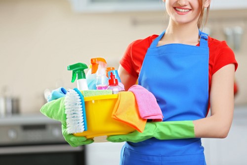 Carpet cleaning team preparing equipment safely before work