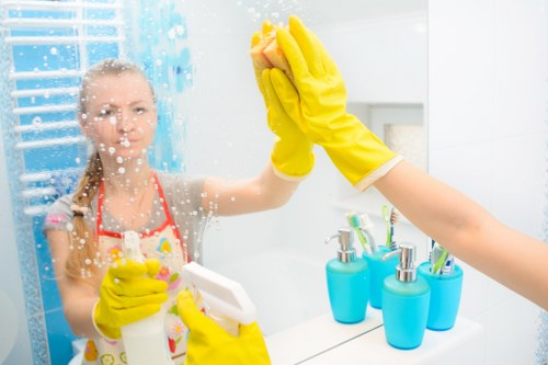 Carpet cleaning technician treating high-traffic flooring